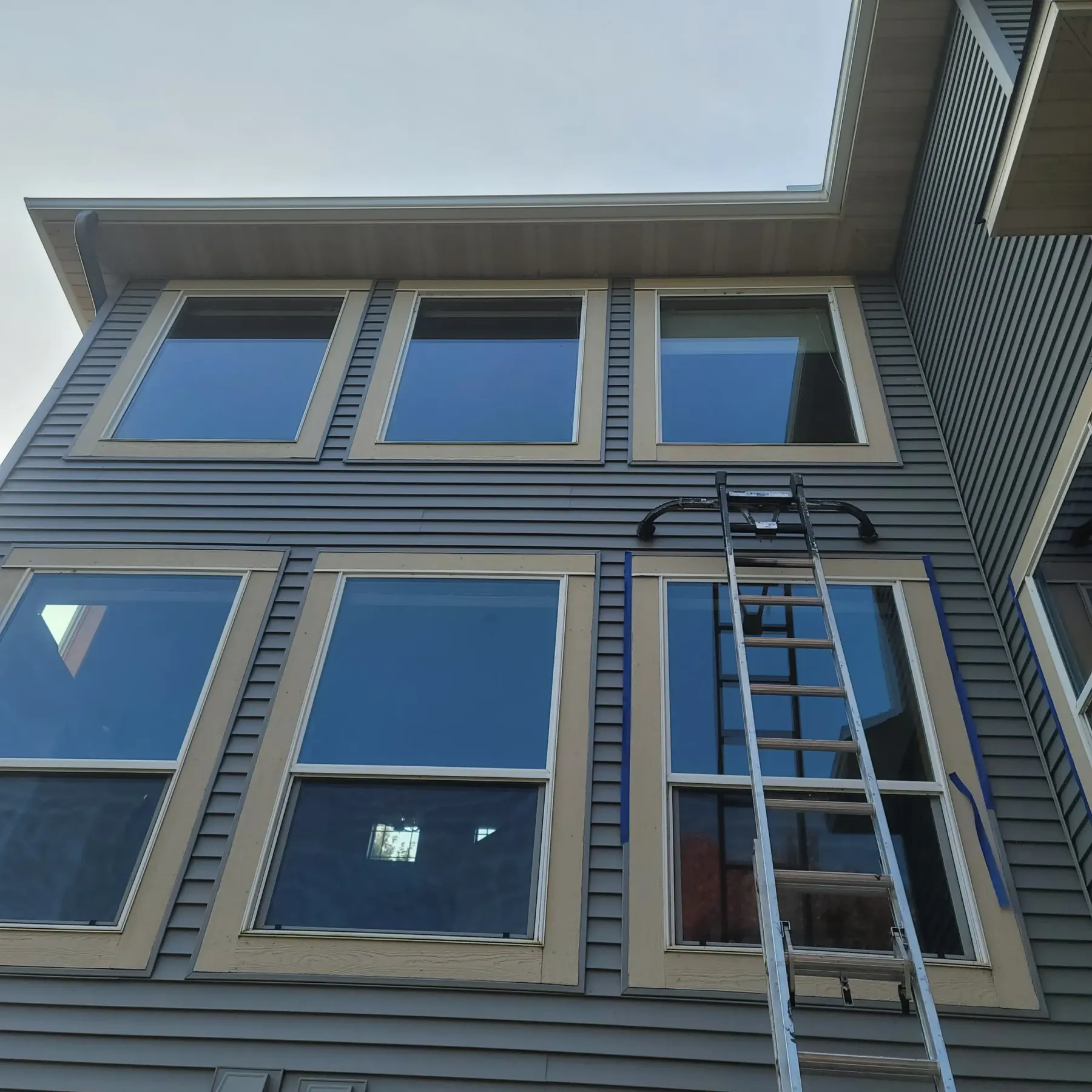 Exterior prep on a tall home